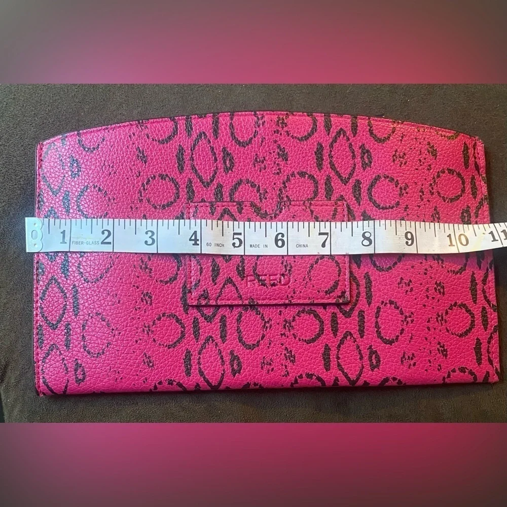 Reed Magenta pouch bag
